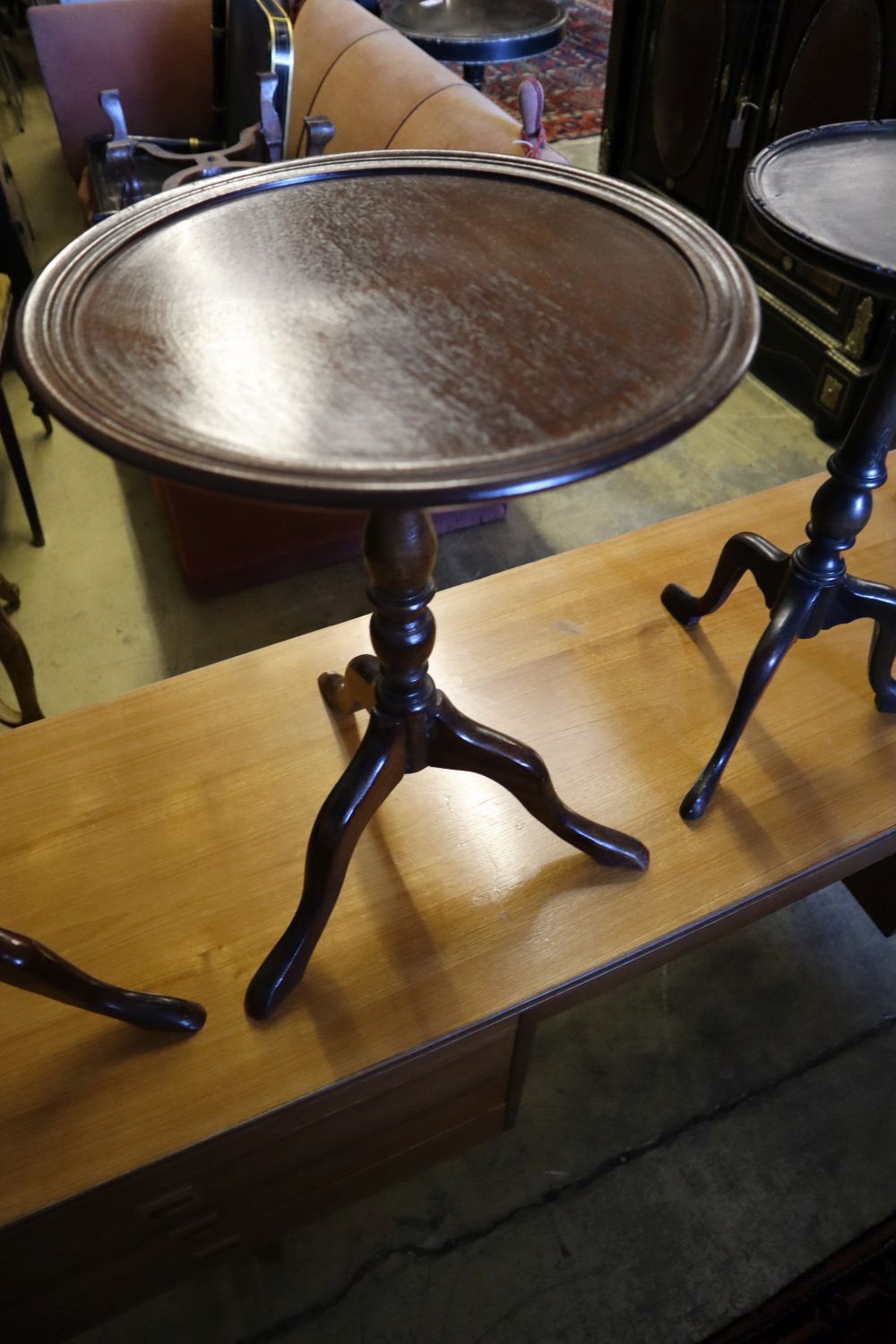 A 1920s chinoiserie lacquer tripod table, height 54cm and three others